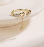 Creative Hollow Heart Shaped Tasseled Gold-Plated Cubic Zirconia Adjustable Open Ring, Jewelry Gift With Box For Daily Wear, Party. Style: Elegant Occasion: Daily Element: Heart Gender: Women Material: Copper