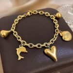 Dolphin Heart Shell Charm